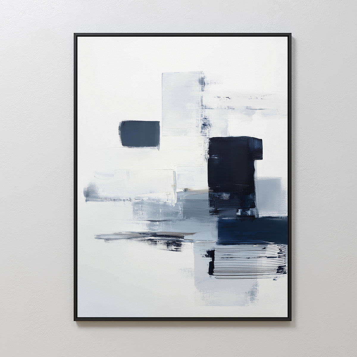 Navy Brushwork Canvas Art - Vertical showcases rectangular shapes in white, gray, and dark blue with smudged and crisp edges. Framed in black, this modern geometric print adds a bold, minimalist touch to your home decor.