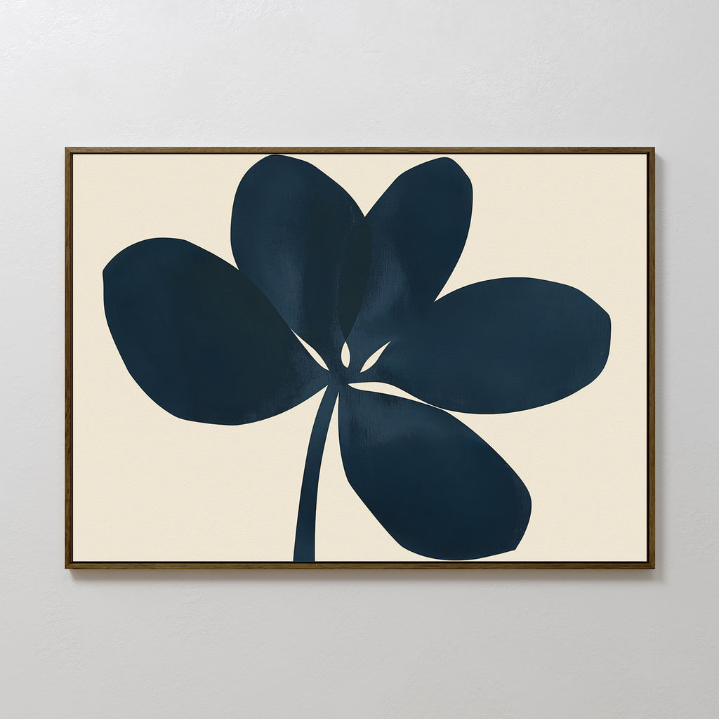 The Navy Clover Canvas Art - Horizontal features a dark blue abstract five-petal flower with a single stem on beige, presented in a slim brown frame, perfect for minimalist wall decor.