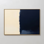 The Navy Division Canvas Art - Horizontal features two vertical halves: a smooth cream left side and a deep navy blue right side with rough, uneven edges blending at the center for a touch of modern elegance.