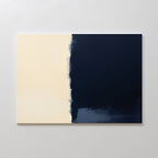 The Navy Division Canvas Art - Horizontal features a minimalist design with a light beige left half and a solid dark navy blue right half, blending subtly in the center for a modern look inspired by Nordic Park aesthetics.
