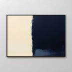 Minimalist Navy Division Canvas Art - Horizontal features a smooth cream left half and a deep navy blue right half with uneven edges. Black-framed, it suits modern spaces—ideal for Nordic Park artwork fans.