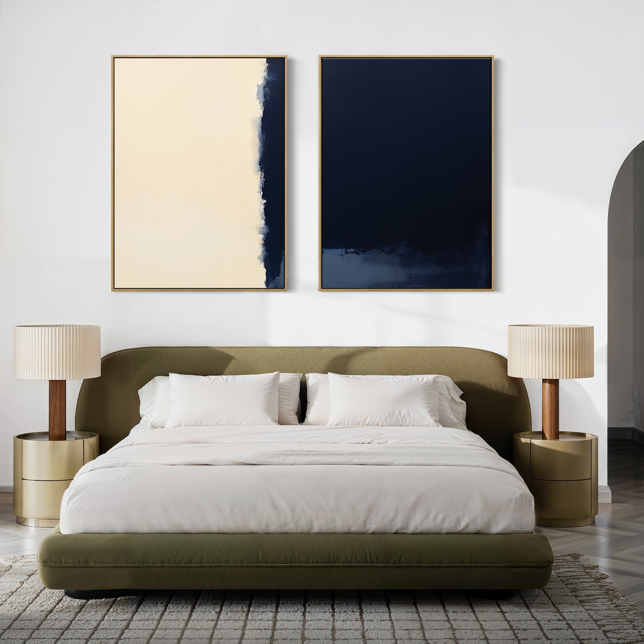 A modern bedroom features a low olive-green bed with white bedding, two beige nightstands with matching lamps, and the "Navy Division - Set Of 2" artwork above the bed, adding a touch of modern elegance.