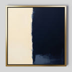 The Navy Division Canvas Art - Square features a minimalist design with a solid dark navy right side and light cream left side, separated by an uneven vertical edge—ideal navy blue wall art for modern interiors.