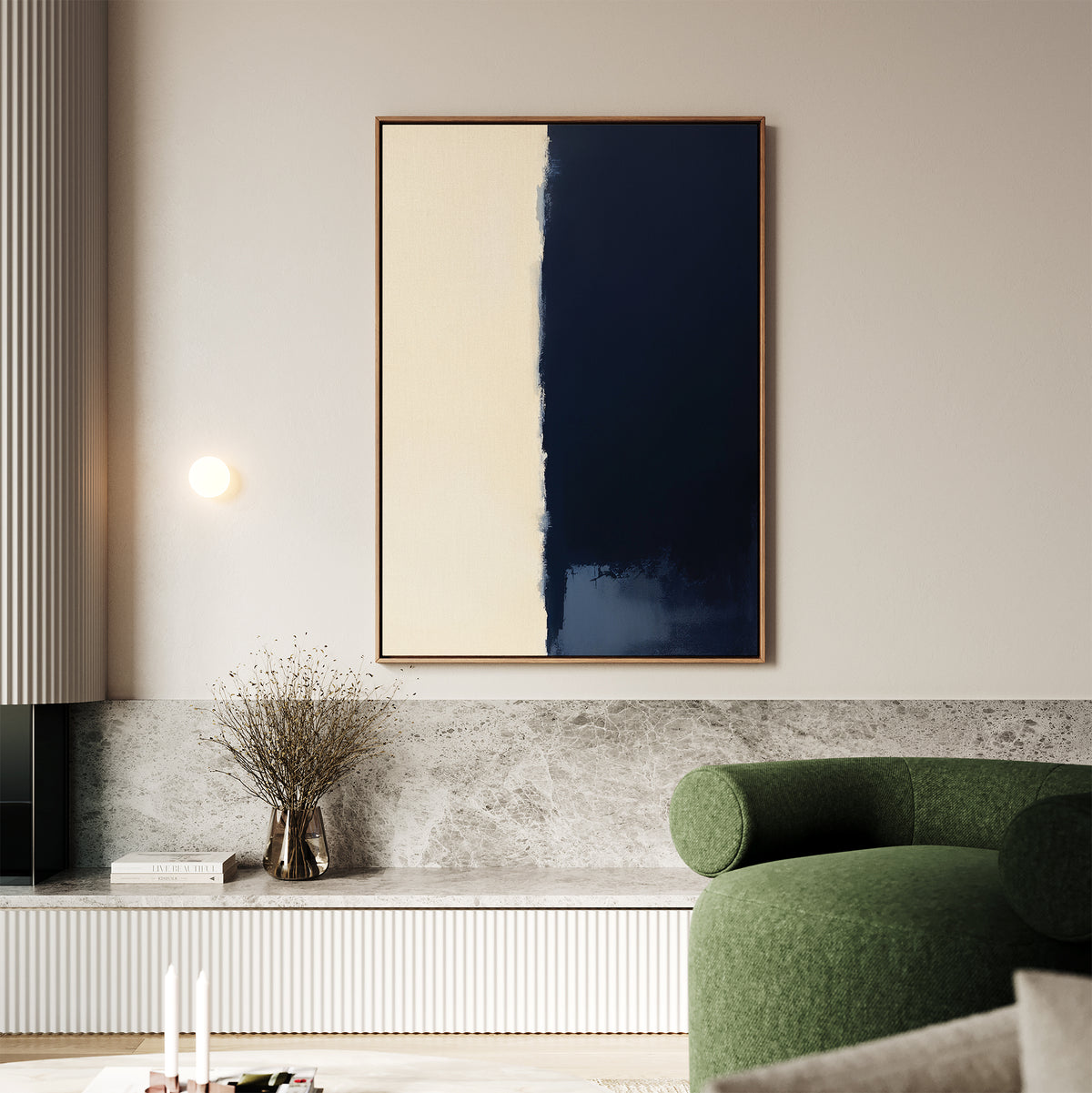 A modern living room with a green curved sofa, marble accent wall, and the Navy Division Canvas Art - Vertical exudes elegance. A round wall light and minimalist print add refinement, while a glass vase with dried branches sits on a low shelf.