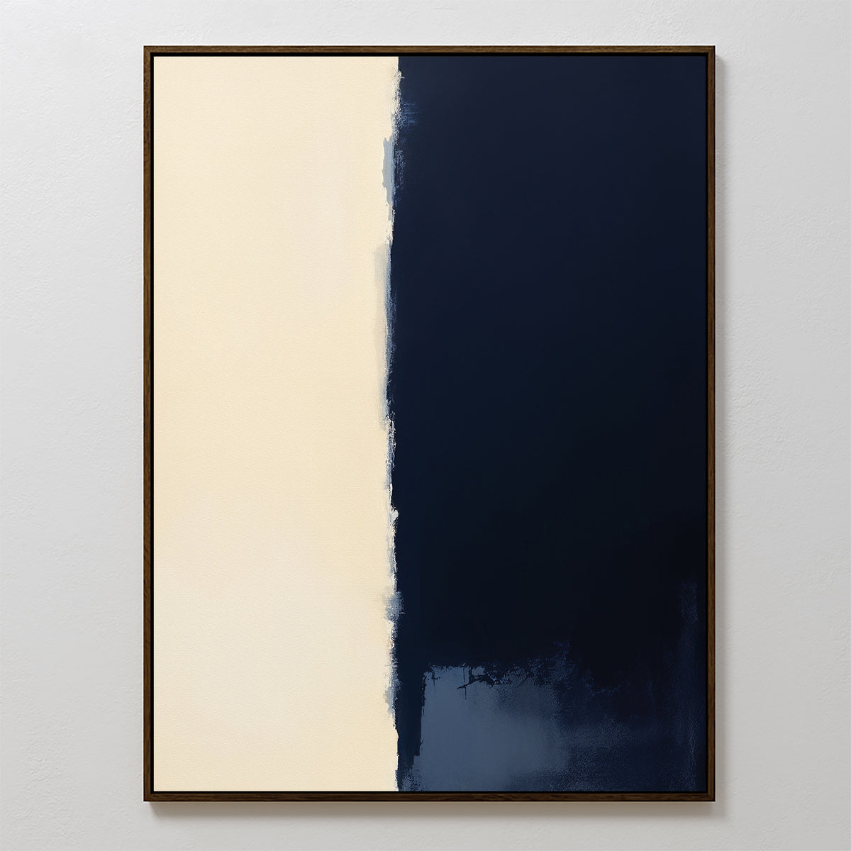 The Navy Division Canvas Art - Vertical features a minimalist rectangular design with smooth off-white on the left and deep navy blue with rough edges on the right, simply framed for a touch of modern elegance in any space.