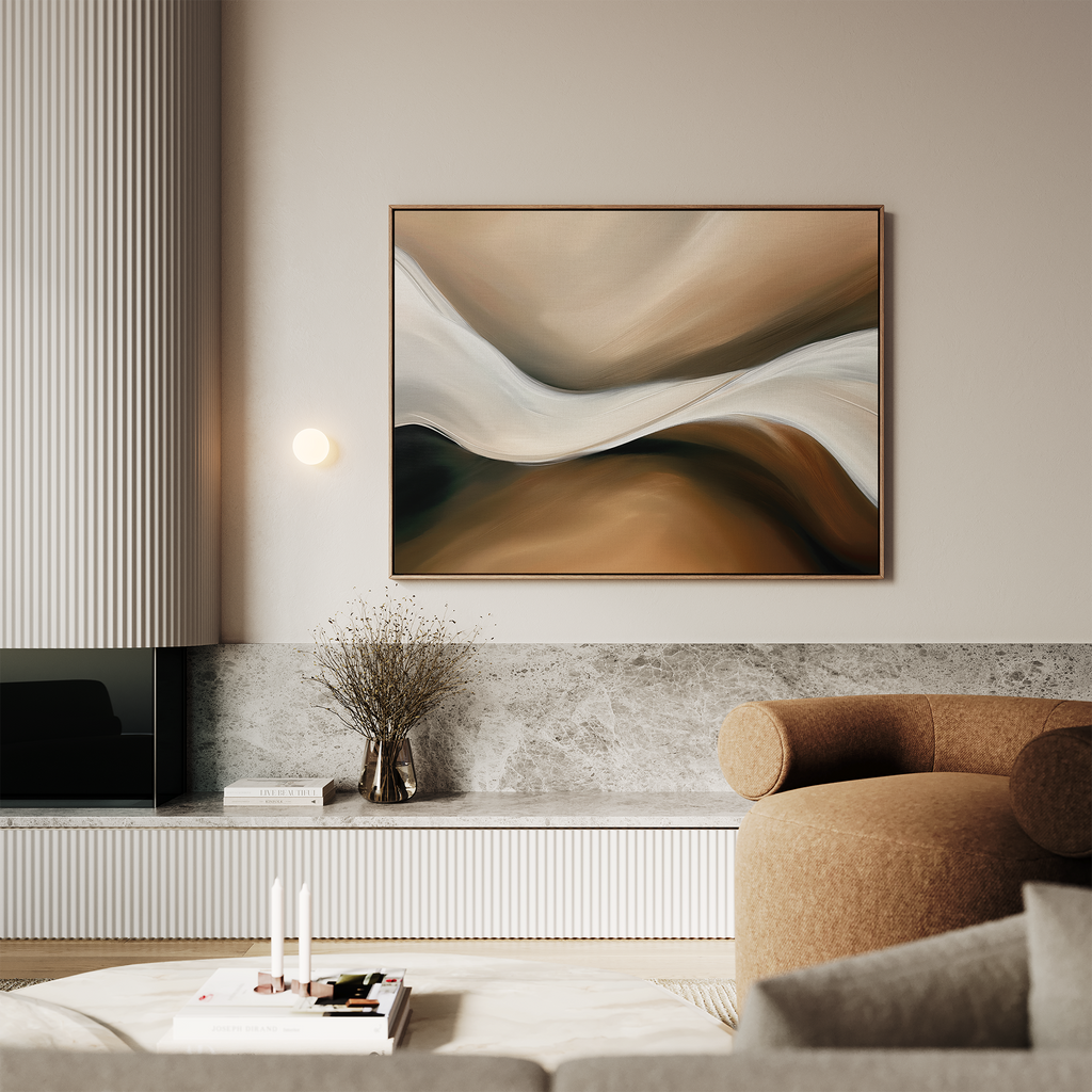 A modern living room with a brown sofa, marble accents, a minimalist coffee table, and the Neutral Landscape River Abstract Canvas Art above a vase of dried branches—an inspiring touch for contemporary decor.