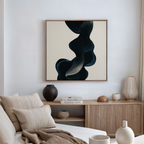 A modern living room features a light sofa with beige cushions, a wooden sideboard with decorative vases, and the Nocturnal Wave Abstract Canvas Art—a striking piece with dark swirling shapes on a light background—completing the decor.