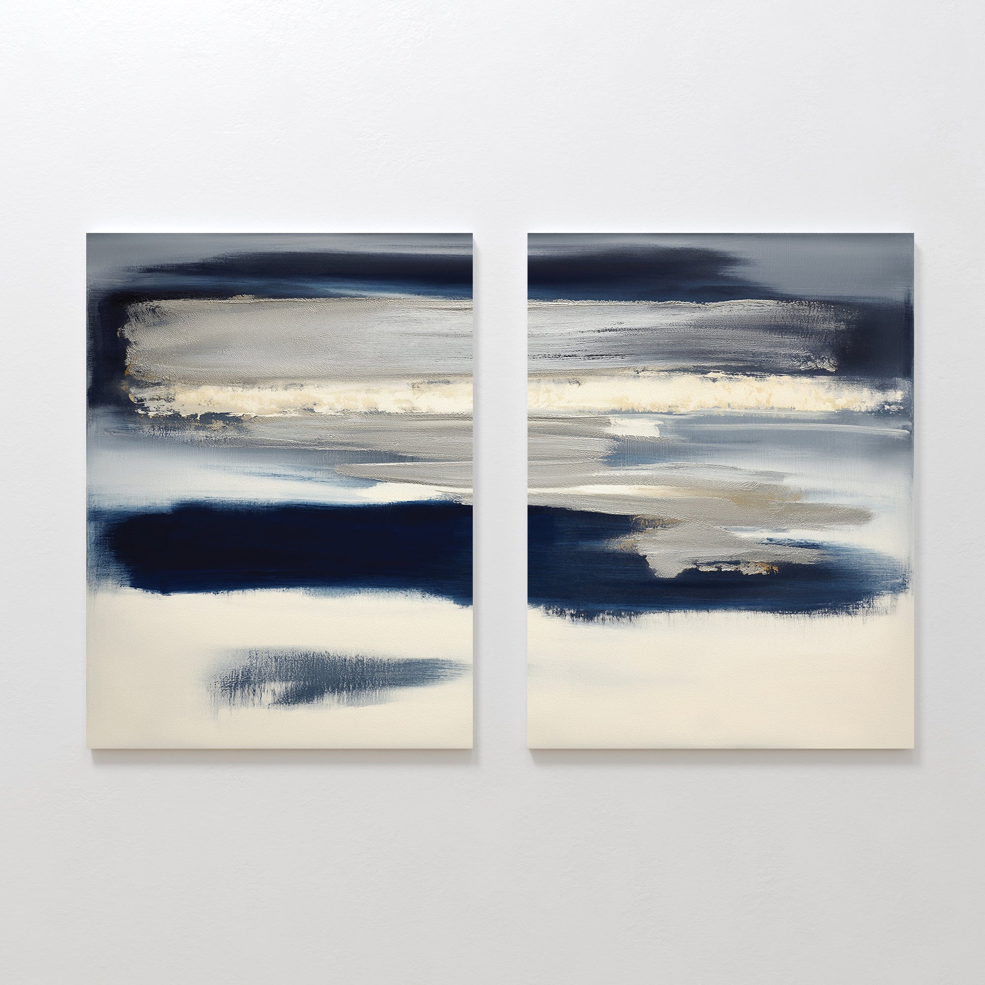 Northern Tides - Set Of 2 displays two abstract paintings side by side, featuring horizontal brushstrokes in minimalist navy, beige, white, and gray tones for a serene, layered look reminiscent of tranquil landscapes or seascapes.
