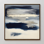 Northern Tides Canvas Art - Square features an abstract design with broad brushstrokes in deep blue, white, and gray, framed in dark wood. Its minimalist style evokes a serene seascape through soft, blended colors.