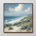 Ocean Bluff Canvas Art - Square showcases waves hitting a sandy shore with dunes and green shrubs below a blue, partly cloudy sky. Distant hills line the horizon—ideal for Nordic Park-inspired coastal decor.