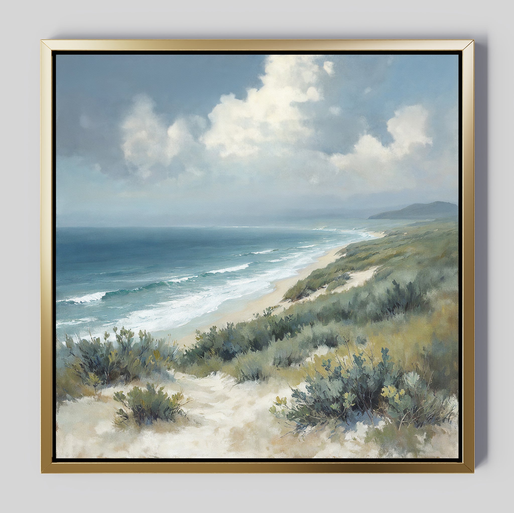 Ocean Bluff Canvas Art - Square: A framed coastal print showcasing sandy dunes with green plants, gentle waves, and a partly cloudy sky. Ideal for bringing Nordic Park-inspired serenity and style to your space.