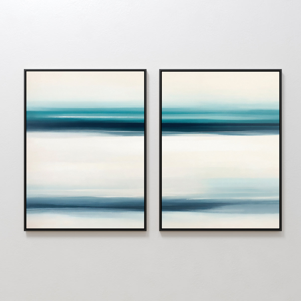 Ocean Motion - Set Of 2 features framed abstract prints with blended blue, teal, and white bands, displayed side by side on a white wall. Their serene colors add sophisticated coastal style to any space.