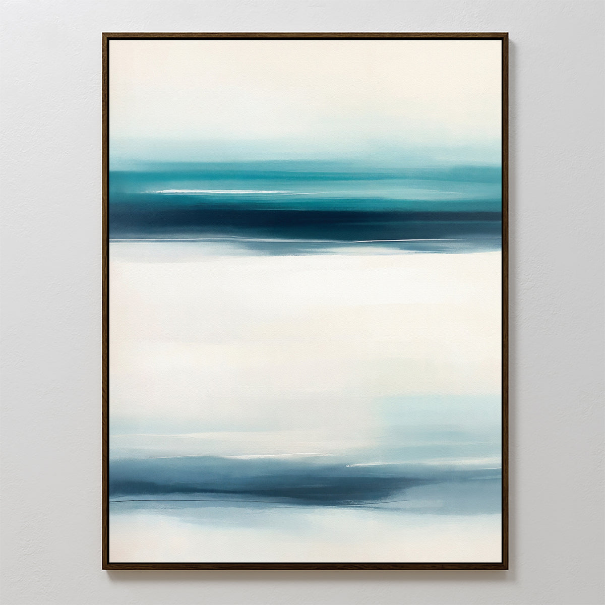 Ocean Motion Canvas Art - Vertical showcases an abstract print with vertical bands of blue, teal, and white blending smoothly. Framed and displayed on a light wall, this artwork brings serene sophistication with its soft color transitions.