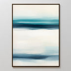Ocean Motion Canvas Art - Vertical showcases an abstract print with vertical bands of blue, teal, and white blending smoothly. Framed and displayed on a light wall, this artwork brings serene sophistication with its soft color transitions.