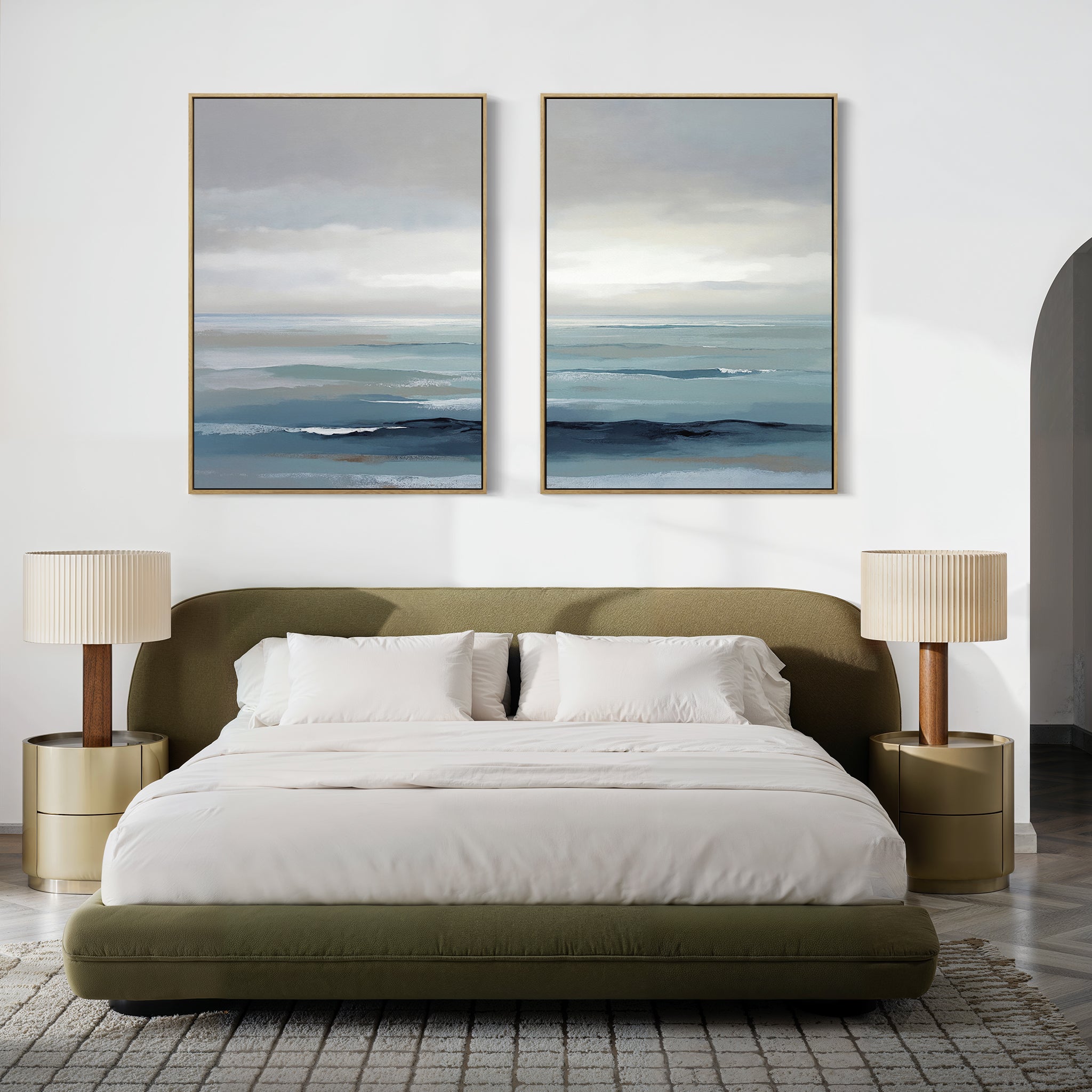 Modern bedroom featuring an olive green bed, white bedding, beige nightstands, and Ocean Swells - Set Of 2 wall art above the bed. Neutral tones and minimal decor evoke a calm atmosphere inspired by Nordic Park charm.