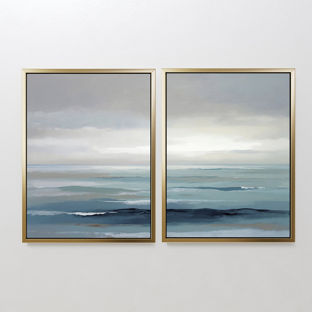 Ocean Swells - Set Of 2 features two framed paintings showcasing gentle waves and a cloudy sky in soft blue and gray tones, bringing a peaceful, minimalist Nordic Park feel—ideal as serene wall art for any space.