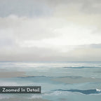 The Ocean Swells Canvas Art - Vertical features soft, muted blues, grays, and whites in gentle ocean waves beneath a cloudy sky—ideal for serene wall decor. Bottom left corner includes the text: Zoomed In Detail.