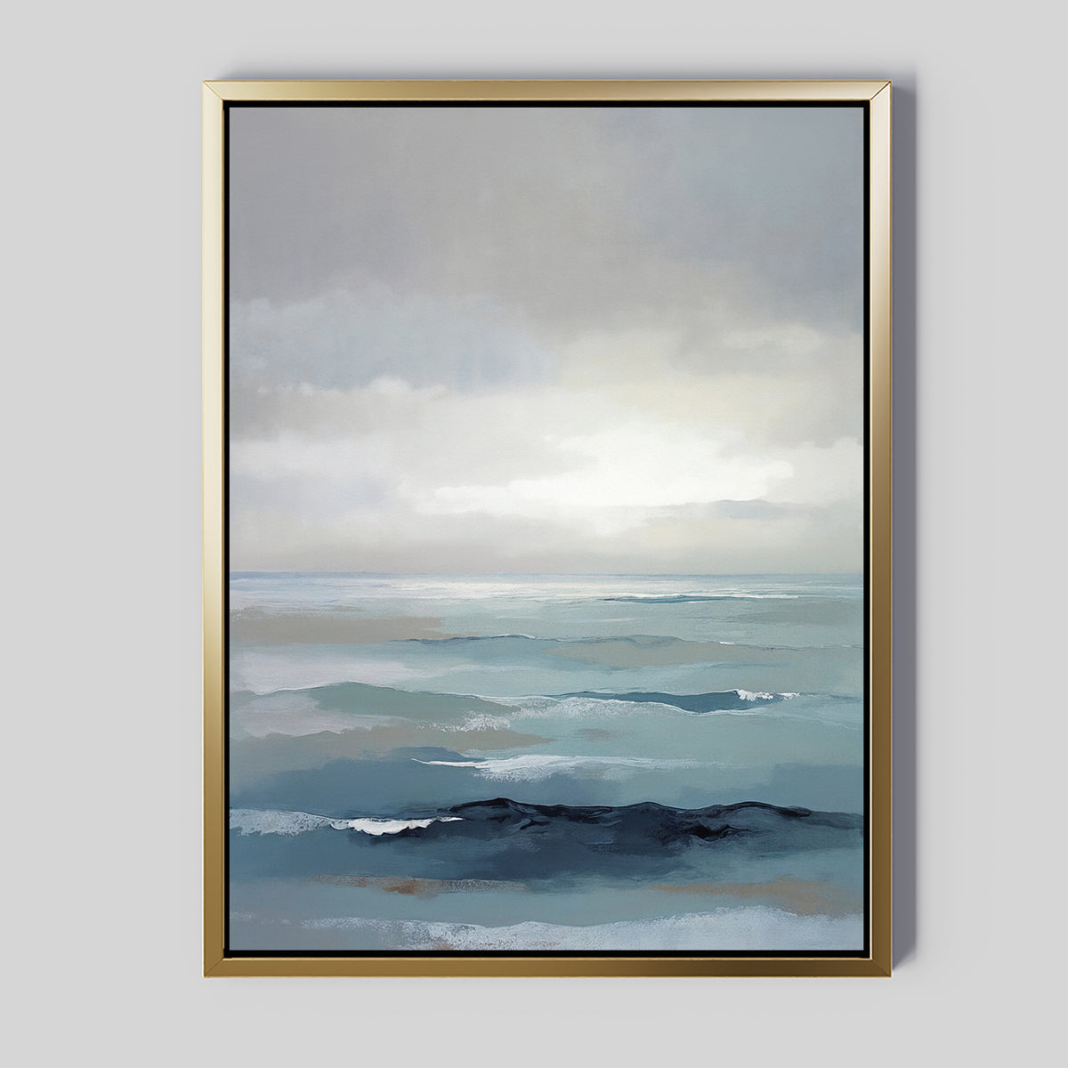 Ocean Swells Canvas Art - Vertical features a calm ocean scene in soft blue and gray tones with gentle waves and a cloudy sky, framed in gold for a striking contrast against its light gray background, creating serene wall art.
