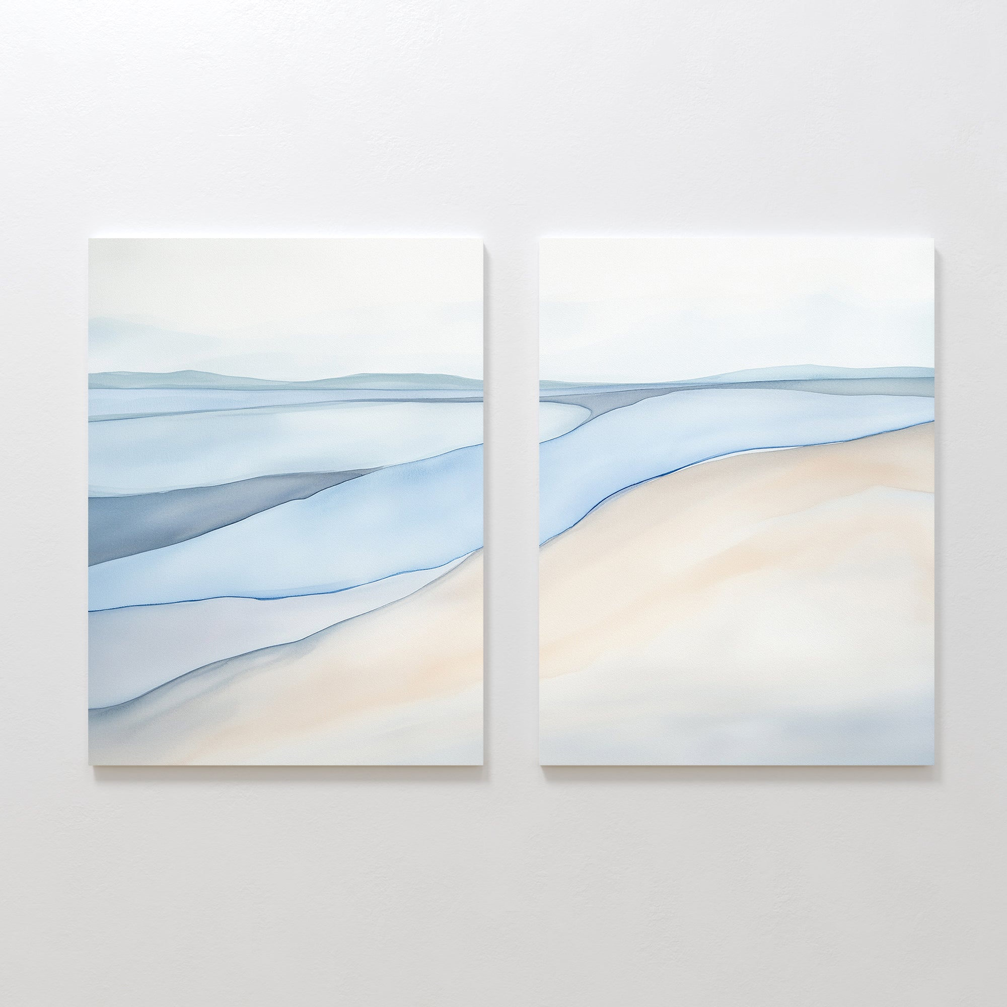 Pale Currents - Set of 2 features abstract canvas prints with soft blue, beige, and gray tones resembling water and sand under a pale sky—calming art ideal for minimalist or Nordic Park-inspired decor.
