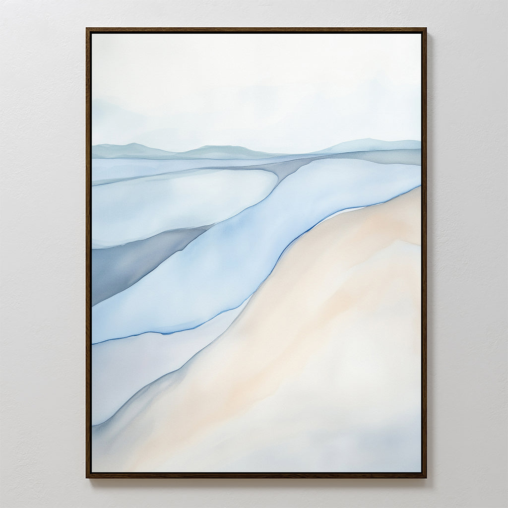 Pale Currents Canvas Art - Vertical features soft pastel blue, beige, and white layers resembling gentle waves or hills. This calming abstract print evokes a serene landscape and is framed with a slim dark border.