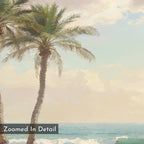 Paradise Found Canvas Art - Horizontal depicts two palm trees by the ocean with soft, painted texture, gentle waves, and a cloudy sky. Features Zoomed In Detail and a label in the lower left corner for an added touch.