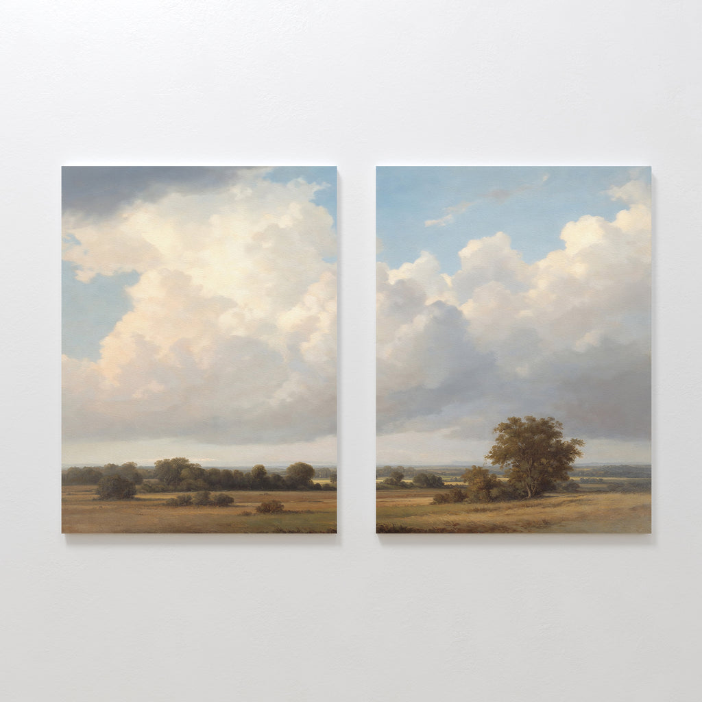 The "Pastoral Grandeur - Set of 2" features two canvas prints side by side, showcasing open grassy fields and scattered trees beneath a bright, partly cloudy sky—ideal for countryside landscape decor.