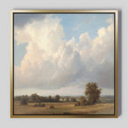 Pastoral Grandeur Canvas Art - Square: a framed countryside print featuring a wide field, scattered trees, and a blue sky with white clouds, bringing a calm and peaceful atmosphere to your space.