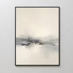 The Peaceful Lake Morning Canvas Art - Vertical features a minimalist misty lake with soft gray and beige tones, faint trees, and gentle reflections. This serene print is framed in black and displayed on a light-colored wall.