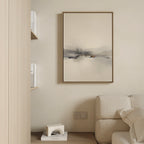 A minimalist living room with a beige sofa, built-in bookshelves, a modern white decor piece, and the Peaceful Lake Morning Canvas Art - Vertical adds a tranquil touch to the wall.