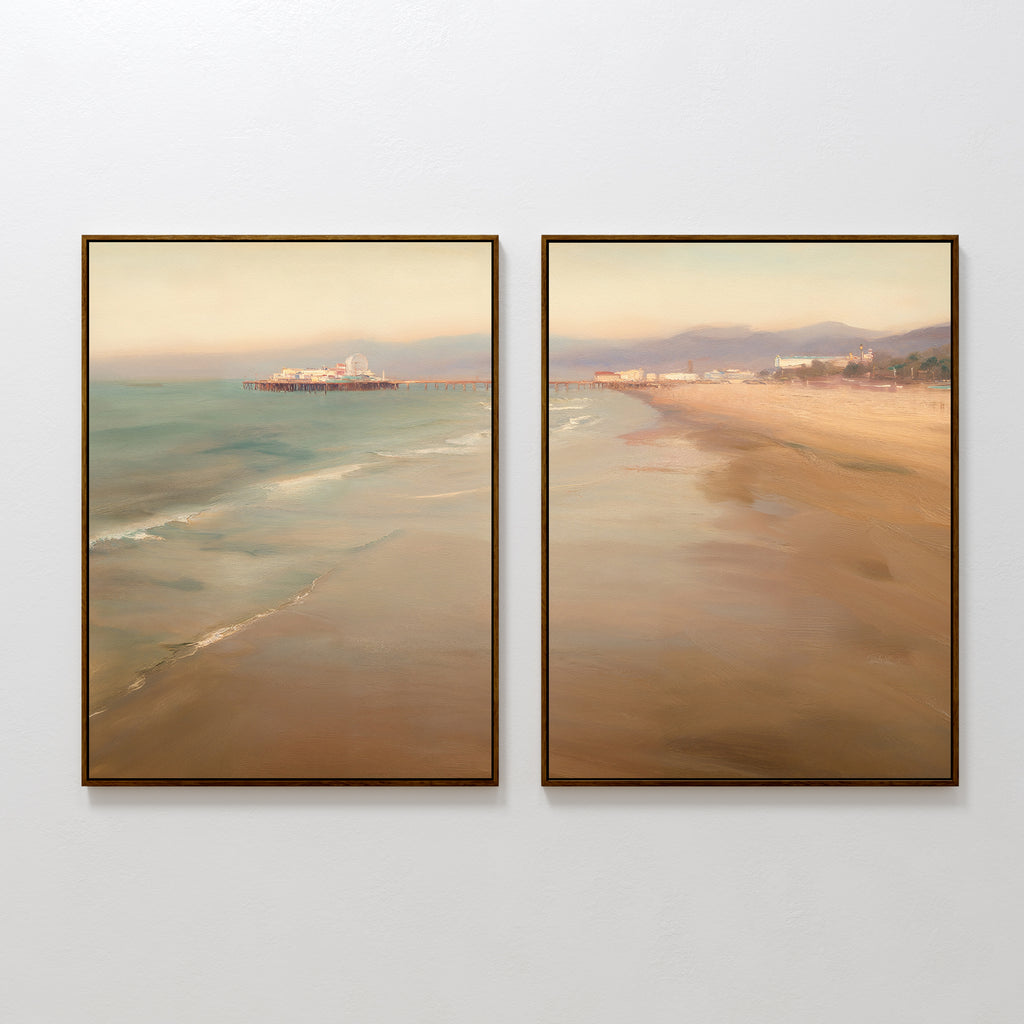 The "Pier Dreams - Set of 2" features framed paintings of a tranquil beach with calm waves and a pier. The soft, hazy sky and muted tones evoke serenity, making this coastal wall art perfect for relaxing spaces.