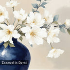 Porcelain Dreams Canvas Art - Horizontal features a deep blue vase with white flowers, yellow centers, and green leaves on a soft beige background. "Zoomed In Detail" appears in the lower left, evoking refined floral artistry.