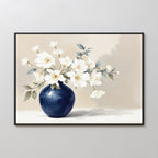 Porcelain Dreams Canvas Art - Horizontal features a framed botanical print of white flowers and green leaves in a round, dark blue vase on a light beige background, exuding soft, minimalist floral elegance.