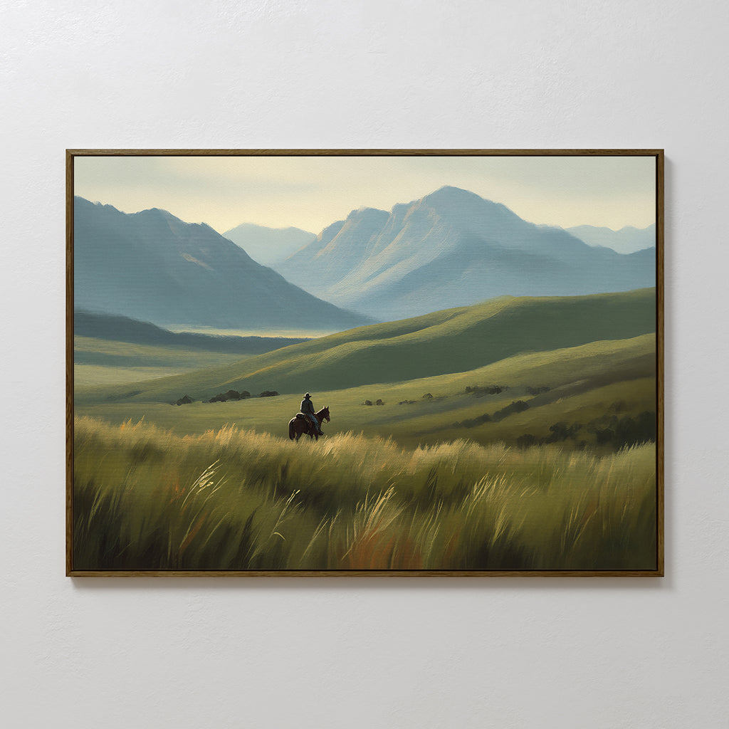 The Prairie Wanderer Canvas Art - Horizontal features a lone rider on horseback across grassy hills and distant mountains beneath a hazy sky—perfect prairie décor for fans of western wall art.