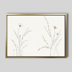 Prairie Whispers Canvas Art - Horizontal features delicate wildflowers and grasses in fine lines and soft pastels, set in a slim gold frame on a light gray background, creating a minimalist and tranquil botanical accent.