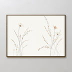 Prairie Whispers Canvas Art - Horizontal features minimalist botanical artwork with light wildflowers and slender stems on a white background in a simple dark frame, adding natural tranquility and an airy touch to your space.