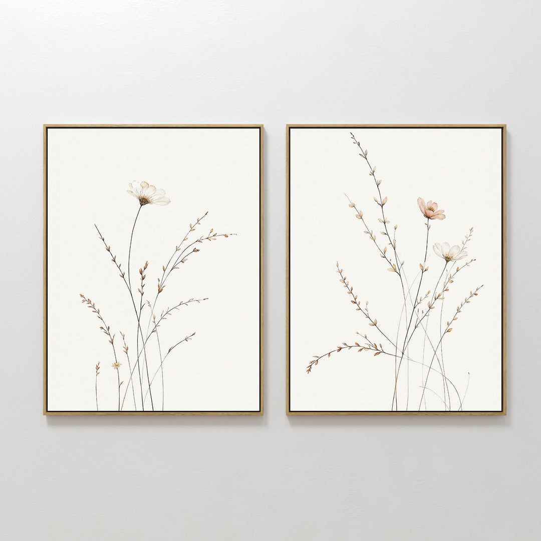 Prairie Whispers - Set of 2 features framed botanical wall art with delicate wildflowers and slender stems in soft, neutral tones, hung side by side—ideal for a Nordic Park-inspired space.