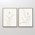 The Prairie Whispers - Set of 2 features minimalist botanical wall art prints with delicate wildflowers on white backgrounds, hung side by side to bring Nordic Park-inspired calm to any room.