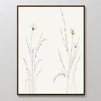 Prairie Whispers Canvas Art - Vertical features minimalist botanical wildflowers and slender stems in neutral tones, presented as a canvas print with a simple dark frame, adding natural tranquility to any light-colored wall.