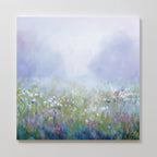 The Purple Haze Canvas Art - Square features a dreamy wildflower meadow in soft purple, pink, blue, and white tones blending into a misty sky—perfect for adding a serene, ethereal touch to your living room decor.