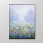 Purple Haze Canvas Art - Vertical: A framed canvas print depicting a misty wildflower field in soft pastels with delicate white, pink, and purple blossoms beneath a hazy sky—ideal for creating a calming bedroom ambiance.