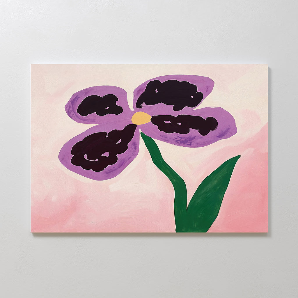 The Purple Pansy Canvas Art - Horizontal features a simple flower with four purple petals and a yellow center, green stem and leaf on a soft pink background—ideal wall art or chic botanical print for your Nordic Park-inspired space.