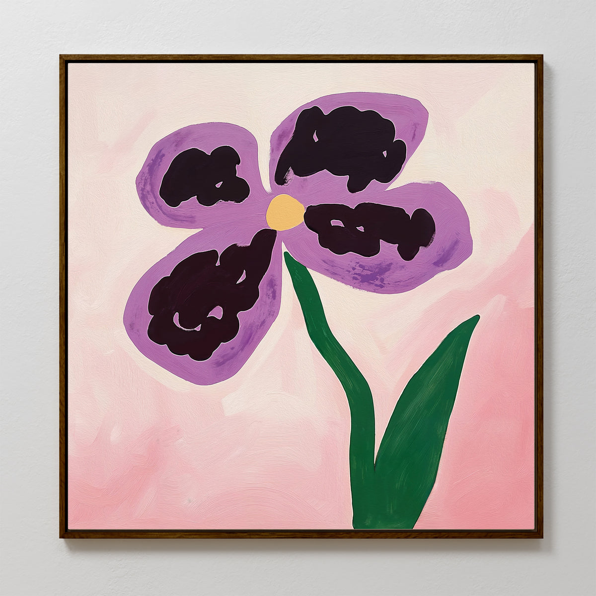The Purple Pansy Canvas Art - Square features a framed botanical print of a stylized flower with four purple petals, a yellow center, and two green leaves set against a soft pink background.