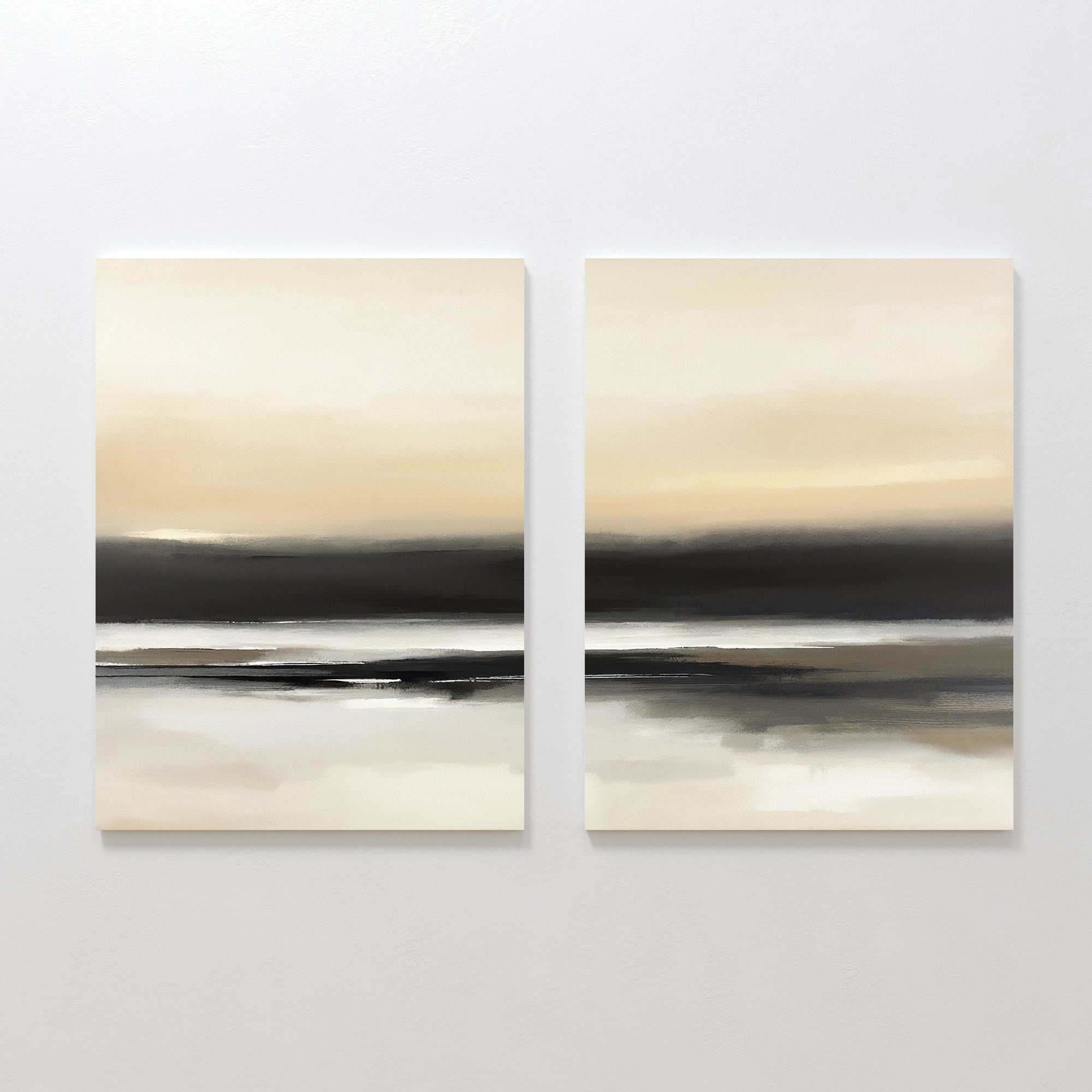The Quiet Shoreline - Set Of 2 features abstract coastal wall art in soft beige, gray, and black tones, evoking calm water reflections for a serene look when displayed side by side on a white wall.