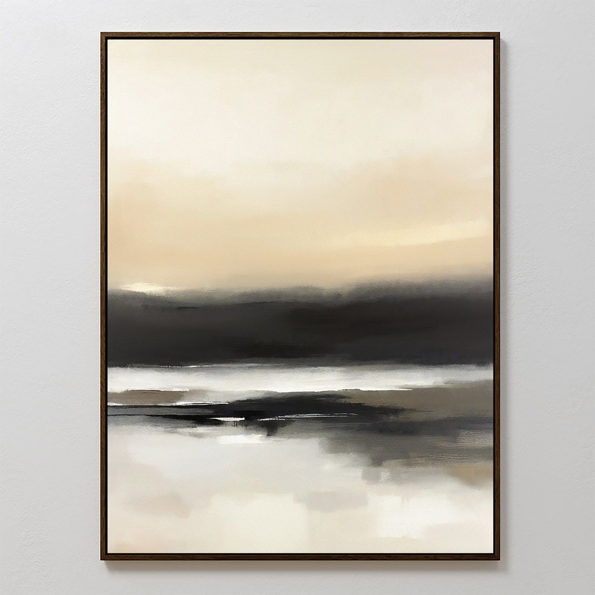 The Quiet Shoreline Canvas Art - Vertical features abstract coastal scenery in soft beige, cream, gray, and black tones. Minimalist and serene, it’s framed in dark wood and elegantly displayed on a white wall for a calming effect.