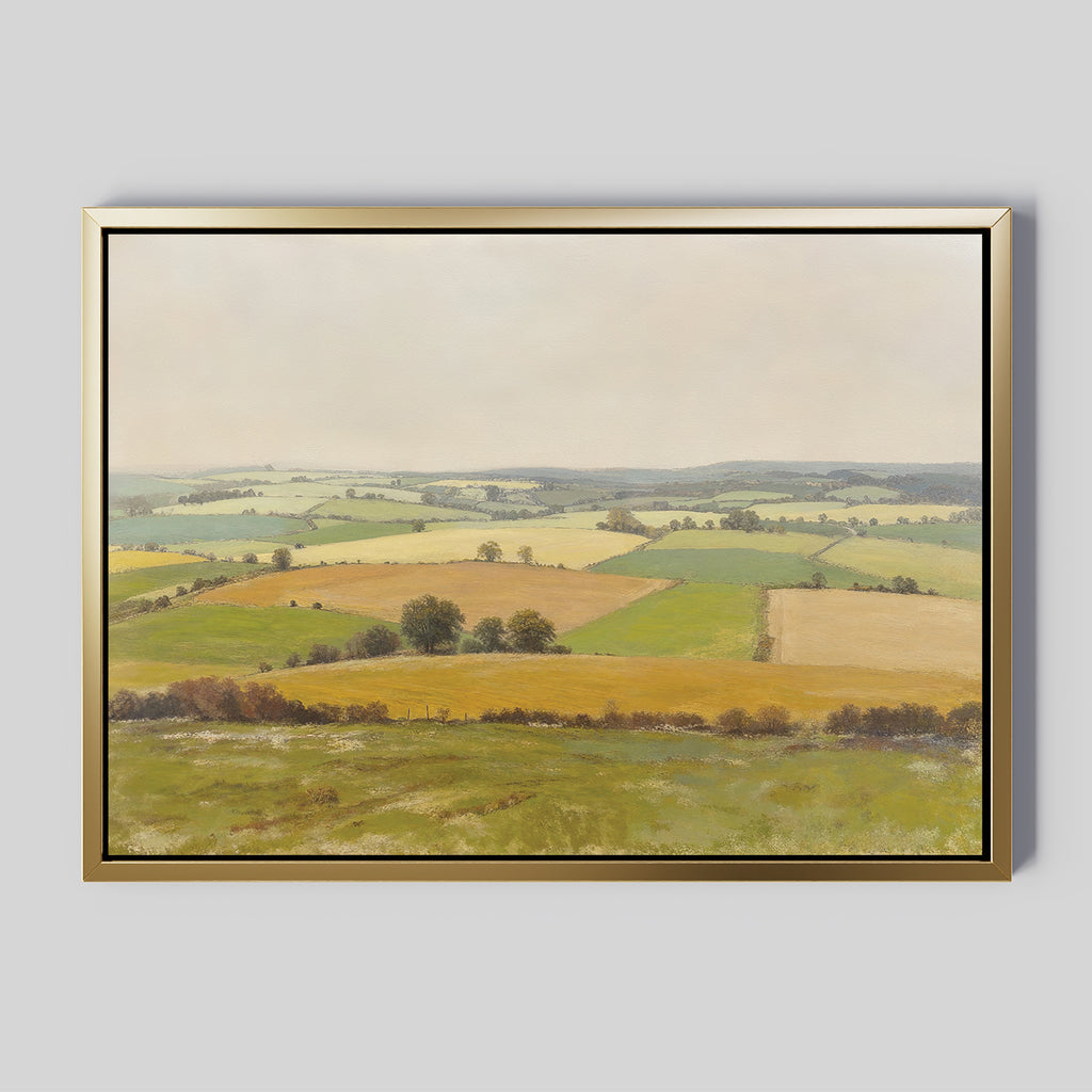 The Rolling Fields Canvas Art - Horizontal features a pastoral landscape with green and yellow fields, scattered trees, and distant hills under an overcast sky, shown against a light gray background.
