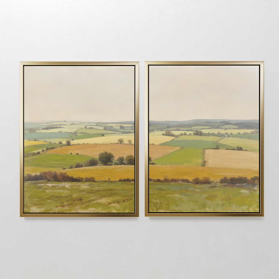 Rolling Fields - Set of 2 features two framed landscape prints of green and yellow fields with scattered trees beneath an overcast sky, creating a panoramic wall art set that brings tranquil natural beauty to your space.