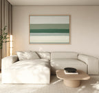 Minimalist living room with a beige sectional sofa, light wood coffee table, Sage Gradient Canvas Art - Horizontal on the wall, floor lamp, corner plant, and neutral decor tones.
