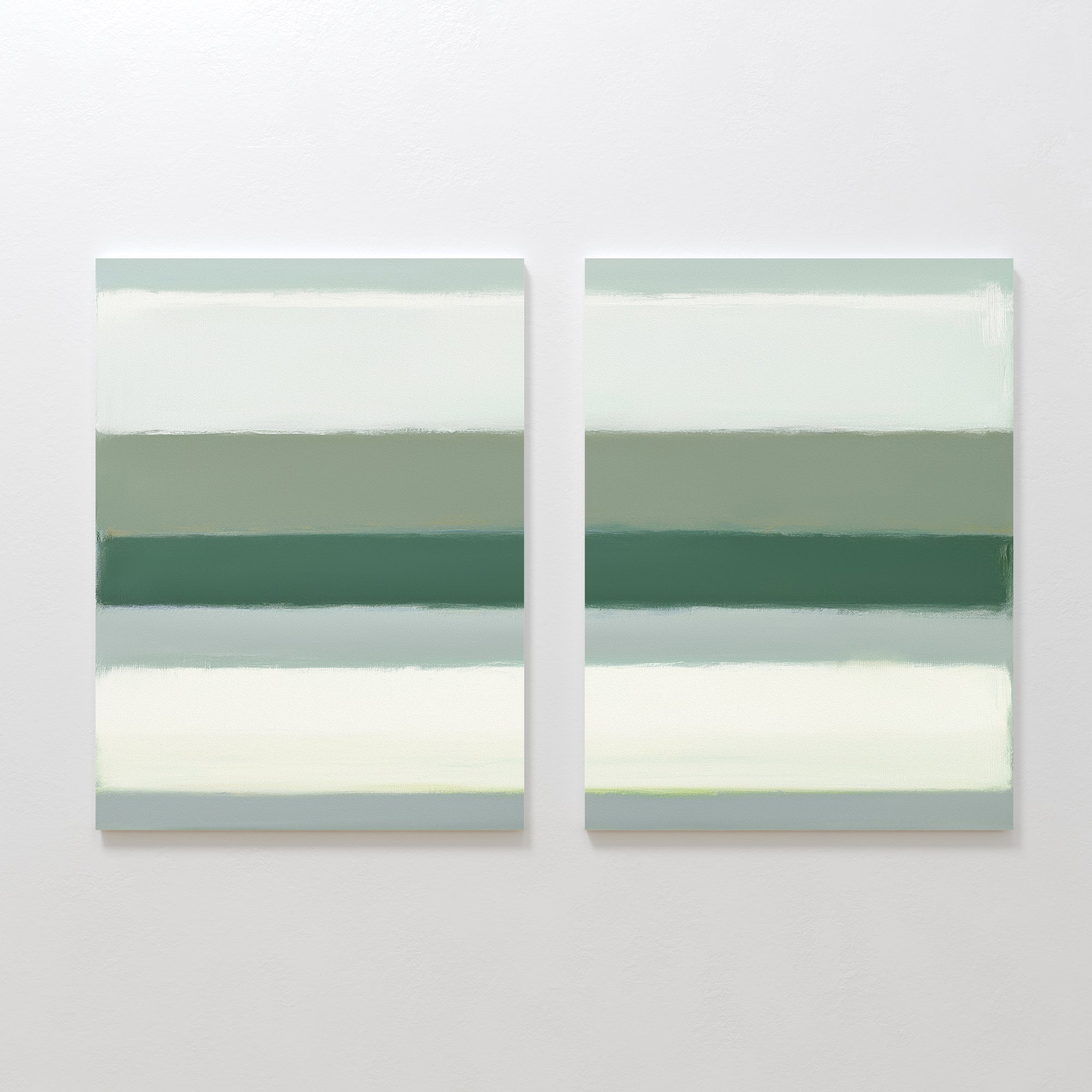 The Sage Gradient - Set Of 2 features two abstract prints with horizontal bands of soft green, teal, gray, and white on a white wall, creating a calm and minimalist Nordic Park-inspired look.