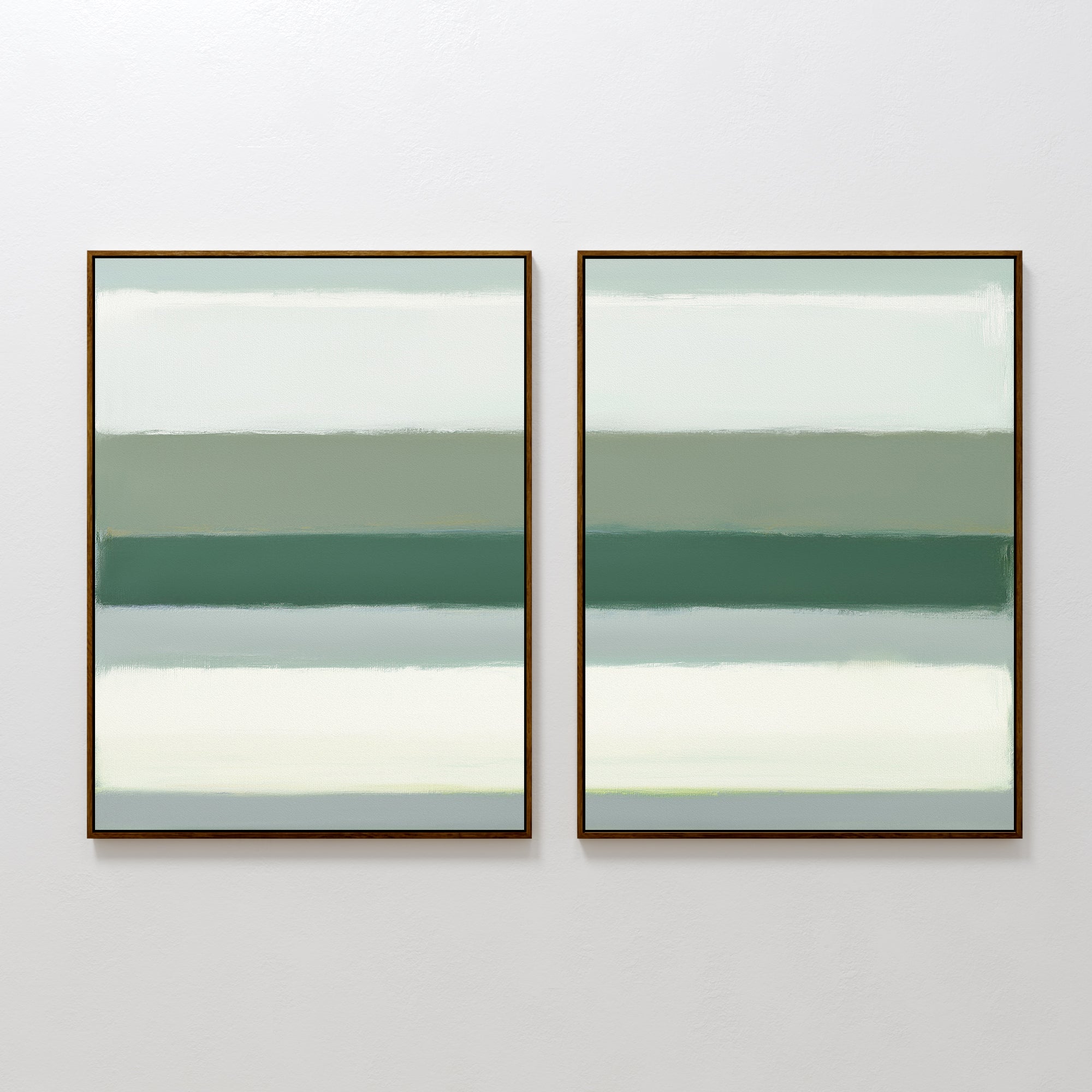 The Sage Gradient - Set Of 2 features abstract prints with soft, blurred horizontal bands in muted green, white, and grayish tones, creating a calming look against a white wall.