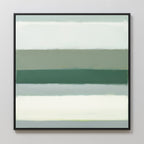 The Sage Gradient Canvas Art - Square showcases horizontal bands of soft green, teal, and white with blurred edges in a calming abstract style. A thin black frame adds elegance, making it ideal for display on a light-colored wall.